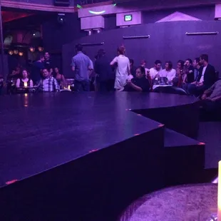 There are VIP tables against that wall and the dancers sometimes work the bars behind the booths.