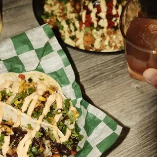 Tacos, queso mac, cocktails...all so damn good.