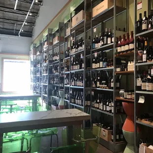 shelves of wine in a wine shop