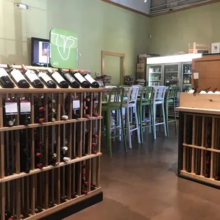 rows of wine bottles in a store