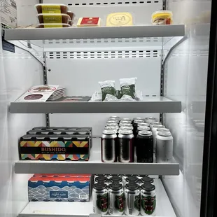 a refrigerator full of cans of beer