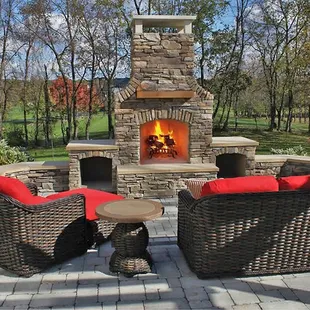 Custom Outdoor Fireplace with Wicker Furniture