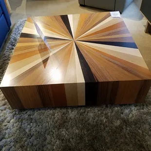 beautiful wood table that is artistic as well as functional