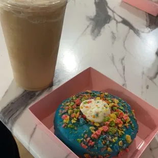 A frozen oatmilk sf caramel latte and a raspberry fruity pebbles donut. Yummy!!