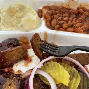 BBQ Baked Beans, Potato Salad and bbq meat with pickles. So good!