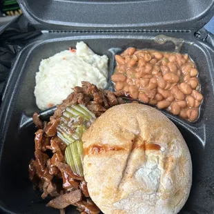 Baked beans, potato salad and Chopped Veef Sandwich