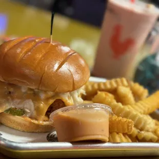 Cheesy Hot Chicken Sandwich Meal, Shake N&apos; Waffle, Red Velvet Cookie, Cookie Monster Cookie.