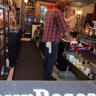 a man working at a bar