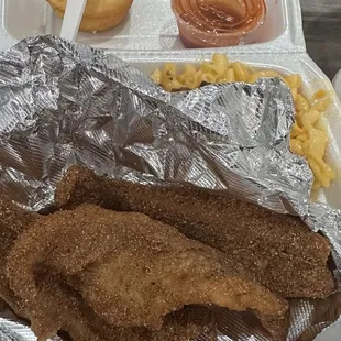 Catfish plate with collard greens and Mac &amp; cheese.