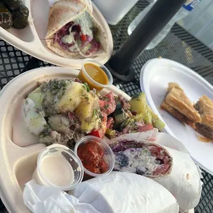 Falafel Sandwich, Chicken Salad Sandwich, potatoes, Greek Salad, Dolmas, &amp; Baklava.