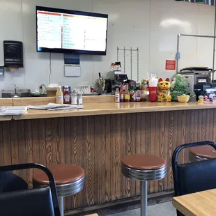 a woman sitting at the bar