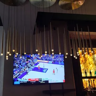 Flatscreens over bar