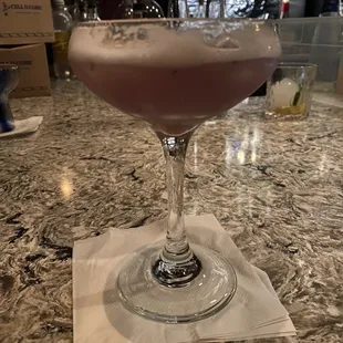 a cocktail in a coupe glass