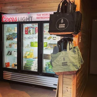 Part of the refrigerated section with a variety of items- milk, eggs, cheese, etc