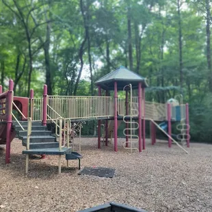 The shaded play area in the hill
