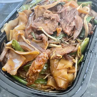 Spicy basil Chow Fun w/ beef - $15. Super delicious. Highly recommend!