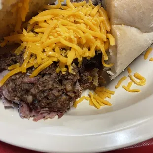 Poor boy sandwich. Had 3 meats. I added the cheese. Not bad. Decent flavor. BBQ sauce was actually pretty good and helped out