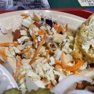 Coleslaw with apples. A bit unusual and sweet. Not a big fan.