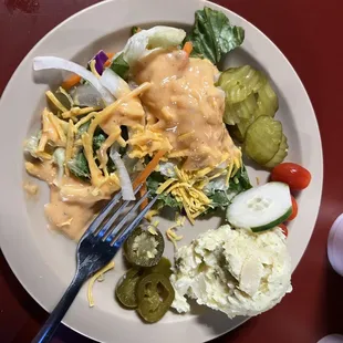 Salad bar was great and the thousand island dressing tasted like it was made in house.