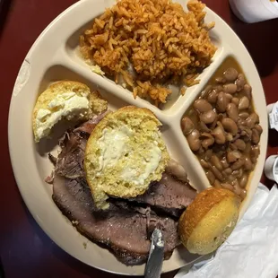 Great brisket, beans, rice and corn bread.