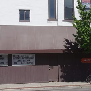 a bicycle parked in front of a building