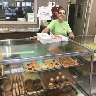 a woman behind the counter