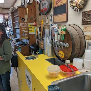 a woman standing in a kitchen