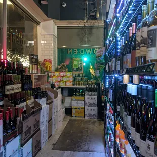 a wide aisle of beer bottles