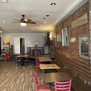 a restaurant with tables and chairs