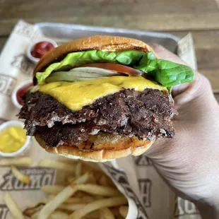 The Original Howdy Burger - double meat, double cheese, lettuce, tomato, onions, rodeo sauce