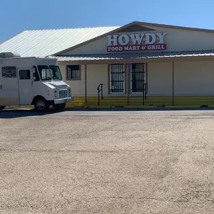 a food truck parked in front of it