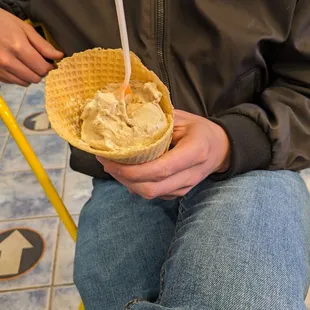 Mocha waffle cone and half eaten scoop - the scoops are huge