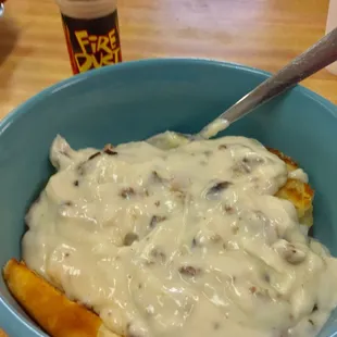 Sausage added to gravy and grilled biscuits $4.50 #UpCloseSavor