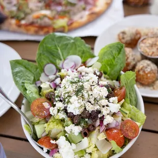 Greek salad - Romaine, Tomato, Cucumber, Red Onion, Olives, Feta Cheese, Vinaigrette