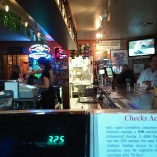 people sitting at the bar