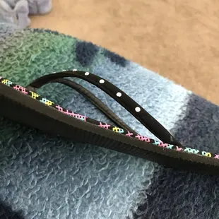 My flip flop shoe to show that my flip flop is thicker the steak I received