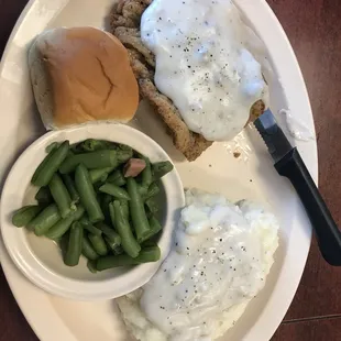 Chicken fried steak with two sides (mashed potatoes, green beans)