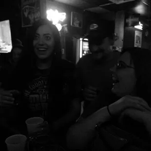 a group of people at a bar