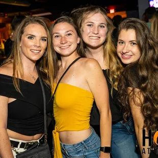 a group of girls posing for a picture
