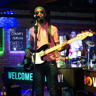 a man playing a guitar