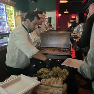 a man serving food