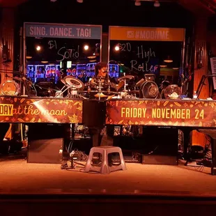 Front and center view of the dualing piano stage.