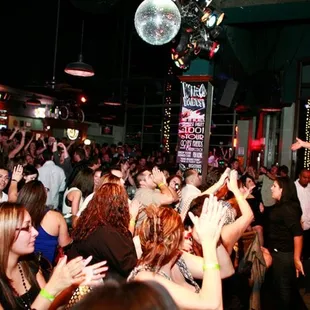 a crowd of people at a party