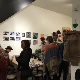 a group of people in a coffee shop