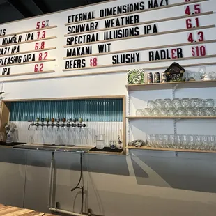 a man standing in front of a bar