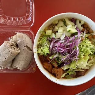 Mango chicken bowl, injera - IG @bougiefoodieboi