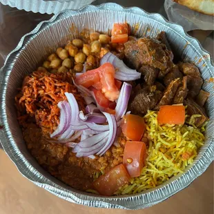 Goat, chickpeas, lentils, half spicy and regular rice, tomatoes, red onions