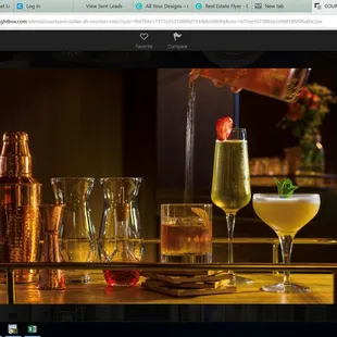 a bar with a variety of drinks