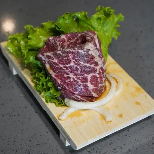 a steak on a cutting board