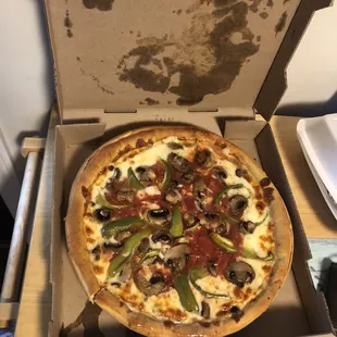 a pizza in a pizza box